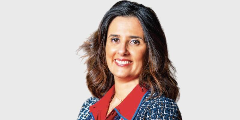 Corporate portrait of Lamia Tazi against a light background