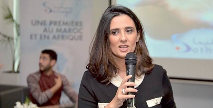 Lamia Tazi speaking at a Sothema event beneath a banner announcing a first for Morocco and Africa